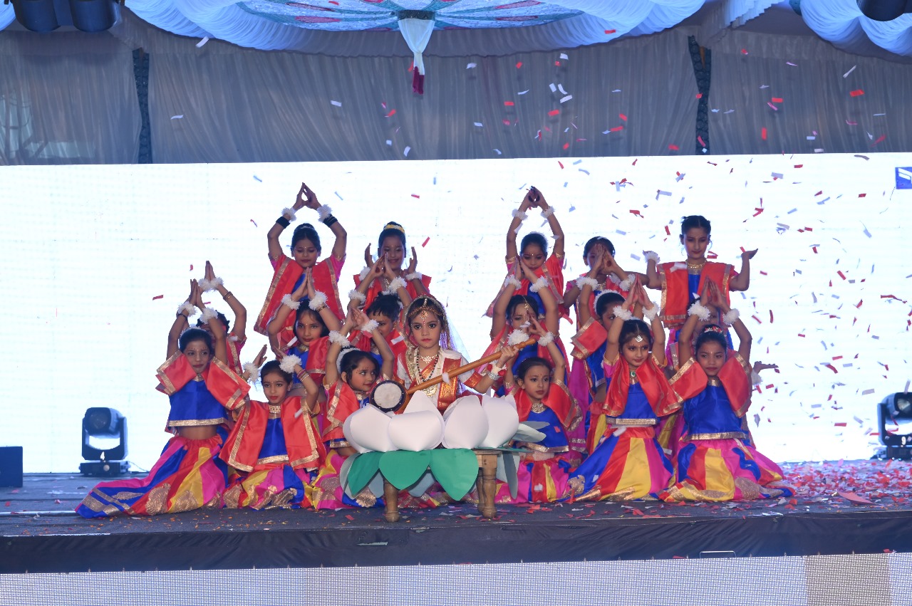 Traditional cultural dance performance on stage.